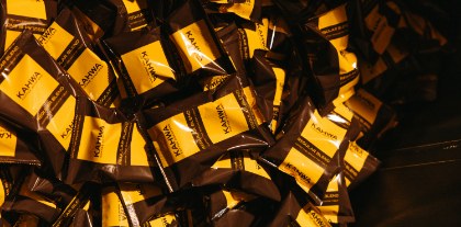 Stack of gold Kahwa Coffee bags